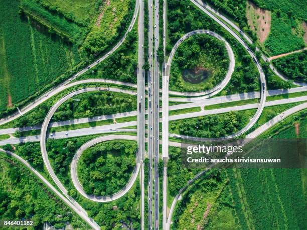 road beautiful aerial view of busy intersection , top view , thailand . - city future ストックフォトと画像