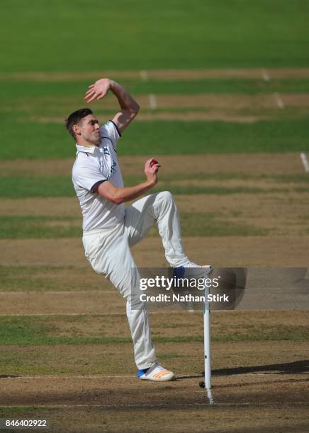 Chris Woakes of Warwickshire runs into bowl during the County Championship Division One match between Warwickshire and Essex at Edgbaston on...