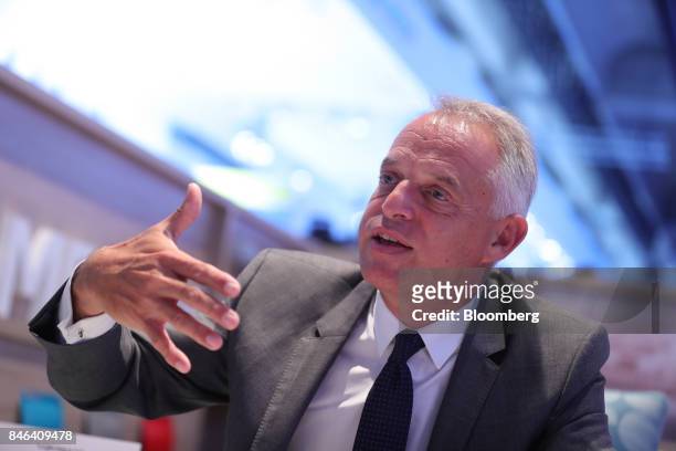 Xavier Peugeot, product director for Peugeot SA, a unit of PSA Peugeot Citroen, gestures during an interview during the second media preview day of...