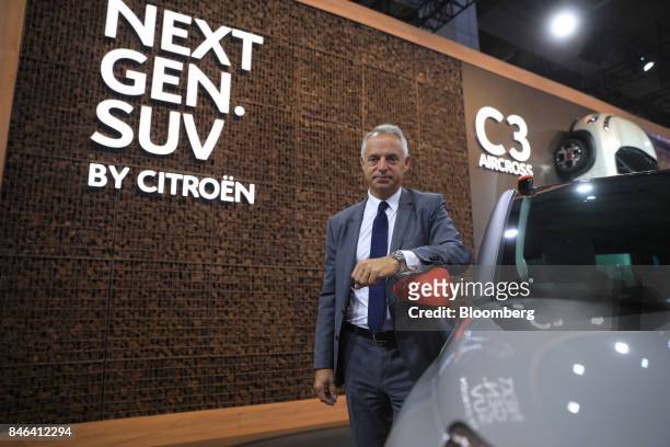 Xavier Peugeot, product director for Peugeot SA, a unit of PSA Peugeot Citroen, poses for a photograph following an interview during the second media...