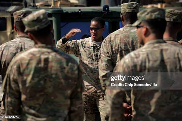 Florida Army National Guard Captain Adam Cockrell address soldiers from Delta Company, 1st Battallion, 124th Infantry, 53rd Infantry Brigade Combat...