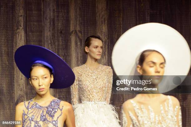 Models pose at the Mehmet Korkmaz presentation during Mercedes-Benz Istanbul Fashion Week September 2017 at Zorlu Center on September 13, 2017 in...