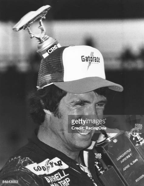 Darrell Waltrip survived a last-lap battle with Richard Petty to win the Rebel 500 at Darlington.