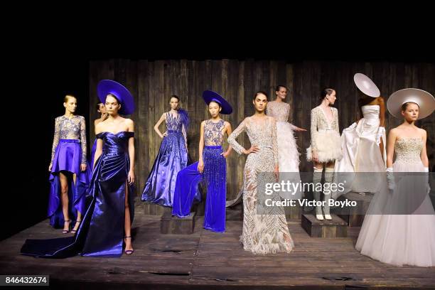 Models pose at the Mehmet Korkmaz presentation during Mercedes-Benz Istanbul Fashion Week September 2017 at Zorlu Center on September 13, 2017 in...