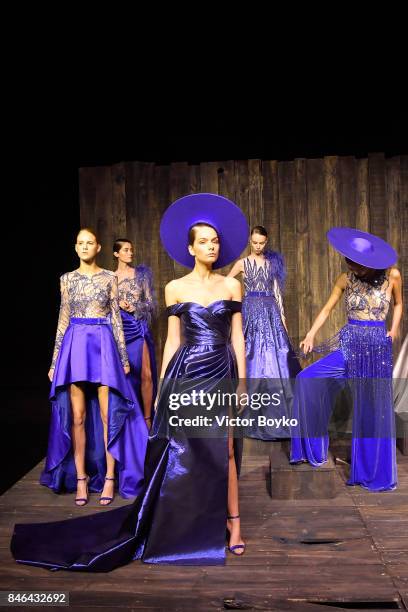 Models pose at the Mehmet Korkmaz presentation during Mercedes-Benz Istanbul Fashion Week September 2017 at Zorlu Center on September 13, 2017 in...