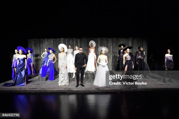 Models pose at the Mehmet Korkmaz presentation during Mercedes-Benz Istanbul Fashion Week September 2017 at Zorlu Center on September 13, 2017 in...