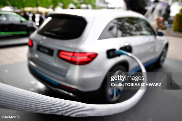 Car is fueled with gaseous hydrogen at the Frankfurt Auto Show IAA in Frankfurt am Main, central Germany, on September 13, 2017. - This year's fair...