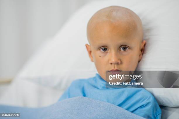 cancer - bald child stock pictures, royalty-free photos & images