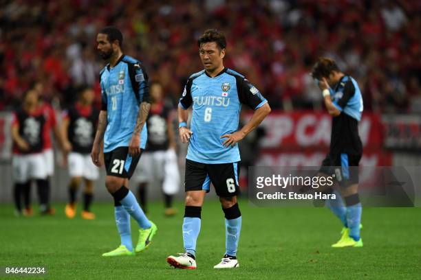 Players of Kawasaki Frontale looks dejected after their 1-4 defeat in the AFC Champions League quarter final second leg match between Urawa Red...