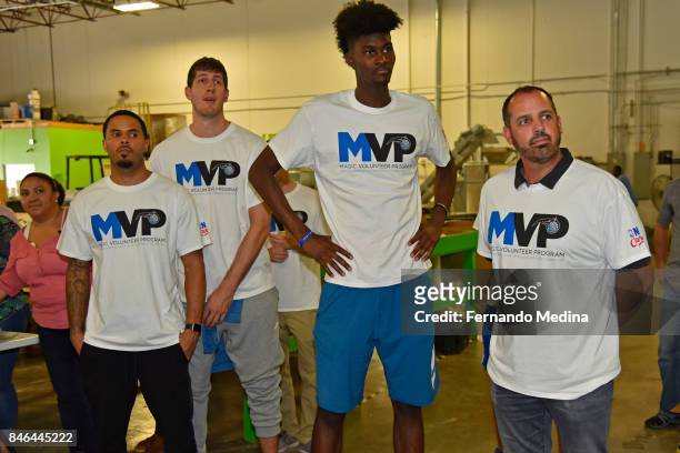 Augustin, Damjan Rudez, Jonathan Isaac and Frank Vogel of the Orlando Magic help with Hurricane Harvey Relief on September 6, 2017 at Clean the World...