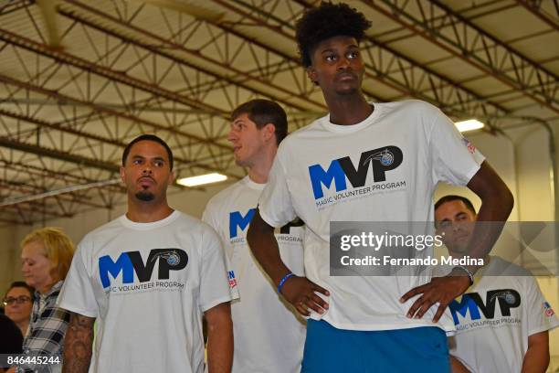 Augustin, Damjan Rudez and Jonathan Isaac of the Orlando Magic help with Hurricane Harvey Relief on September 6, 2017 at Clean the World in Orlando,...