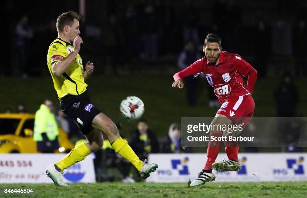 Karim Matmour of Adelaide United has a shot on goal which hits the post during the FFA Cup Quarter Final match between Heidelberg United FC and...
