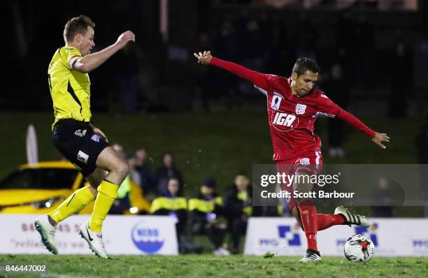 Karim Matmour of Adelaide United has a shot on goal which hits the post during the FFA Cup Quarter Final match between Heidelberg United FC and...