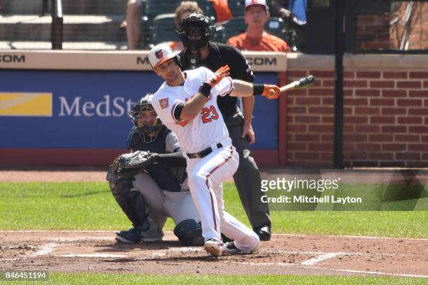Joey Rickard of the Baltimore Orioles takes a swing during a baseball game against the New York Yankees at Oriole Park at Camden Yards on September...