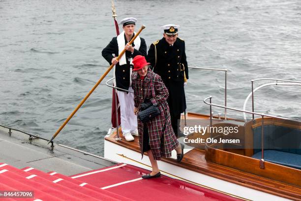 Queen Margrethe II of Denmark returns to quay after attending the farewell parade at the royal ship Dannebrog which marks the end of the sailing...