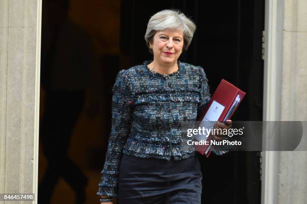 Britain's Prime Minister Theresa May leaves 10 Downing Street in central London on September 13 on her way to the Houses of Parliament to speak at...