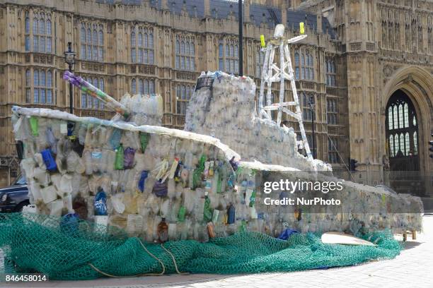 Boat made of plastic bottles, is seen outside the Parliament, in London on September 13, 2017. The boat has been built by the members of 'Surfers...