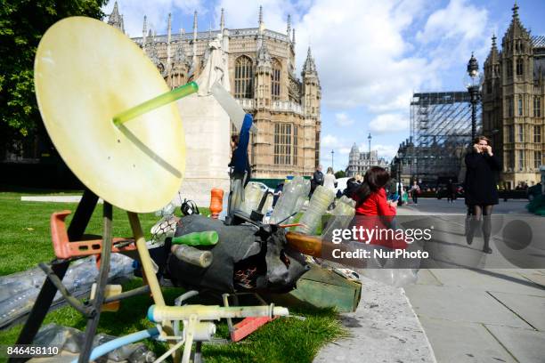 Boat made of plastic bottles, is seen outside the Parliament, in London on September 13, 2017. The boat has been built by the members of 'Surfers...