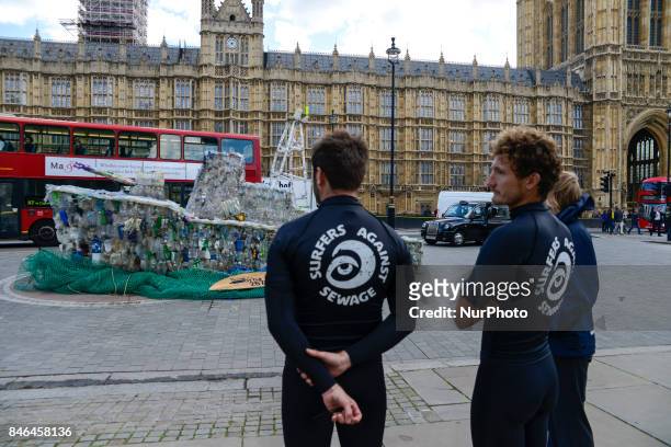 Boat made of plastic bottles, is seen outside the Parliament, in London on September 13, 2017. The boat has been built by the members of 'Surfers...