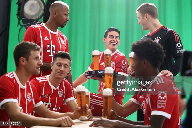 Thomas Mueller, Robert Lewandowski, Jerome Boateng, Robert Lewandowski, James Rodriguez, David Alaba and Manuel Neuer attend the FC Bayern Muenchen...