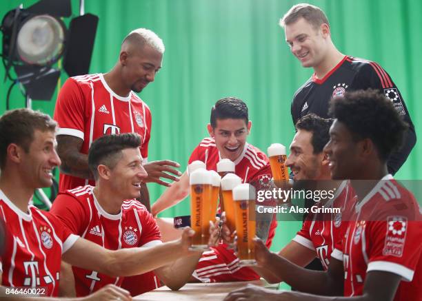 Thomas Mueller, Robert Lewandowski, Jerome Boateng, Robert Lewandowski, James Rodriguez, David Alaba and Manuel Neuer attend the FC Bayern Muenchen...