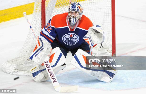 Goaltender Richard Bachman of the Edmonton Oilers plays in the game against the Dallas Stars at Rexall Place on March 27, 2015 in Edmonton, Alberta,...