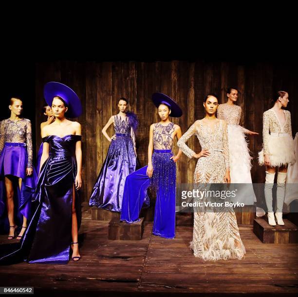 Models pose at the Mehmet Korkmaz presentation during Mercedes-Benz Istanbul Fashion Week September 2017 at Zorlu Center on September 13, 2017 in...
