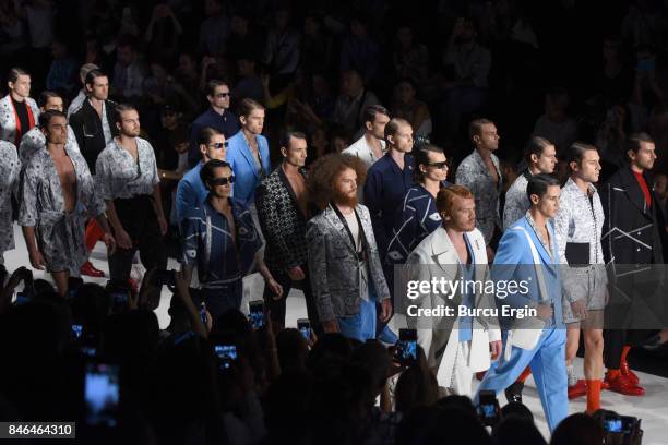 Models walk the runway at the Emre Erdemoglu show during Mercedes-Benz Istanbul Fashion Week September 2017 at Zorlu Center on September 13, 2017 in...