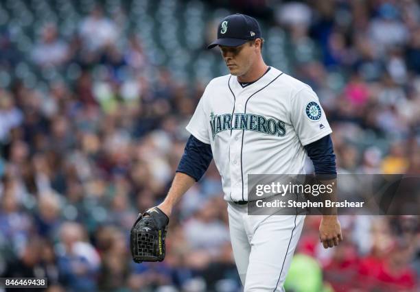 Starting pitcher Andrew Albers of the Seattle Mariners walks off the field during a game against the Los Angeles Angels of Anaheim at Safeco Field on...