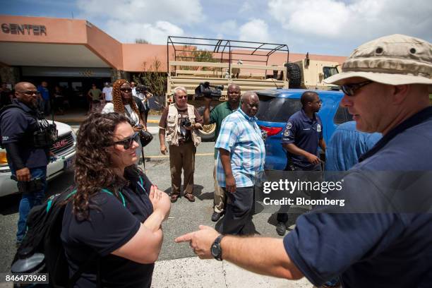 Kenneth Mapp, governor of the U.S. Virgin Islands, center, accesses the damage after Hurricane Irma in St John, U.S. Virgin Islands, on Tuesday,...