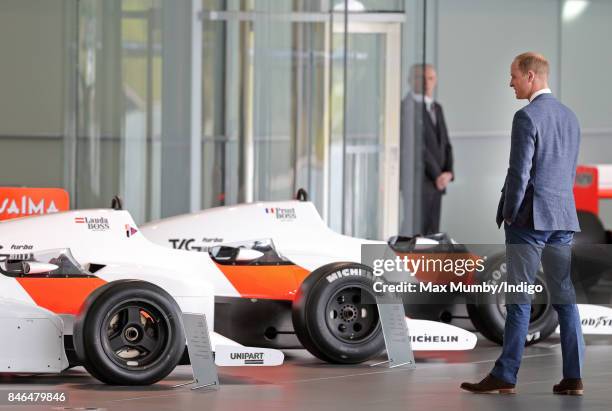 Prince William, Duke of Cambridge views some McLaren Formula One racing cars as he visits McLaren Automotive at the McLaren Technology Centre on...