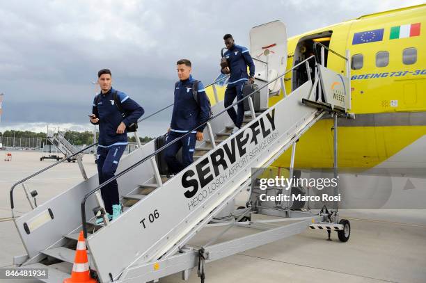 Thomas Strakosha, Chris Oikonomidis and Felipe Caicedo disembark the plane as SS Lazio travel to Arnhem ahead of their UEFA Europa League match...