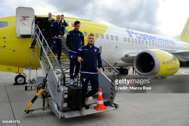 Marco Parolo and Ciro Immobile disembark the plane as SS Lazio travel to Arnhem ahead of their UEFA Europa League match against Vitesse Arnhem on...