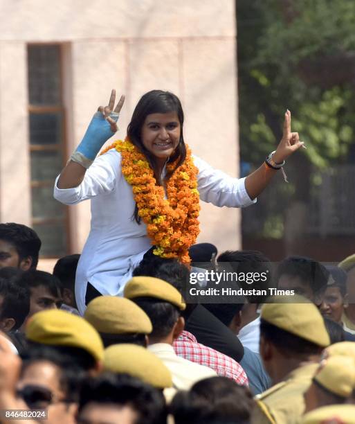 Mahamedha, ABVP candidates for secretary, celebrates after her win during the DUSU Election result at Arts Faculty in North Campus, Delhi University,...