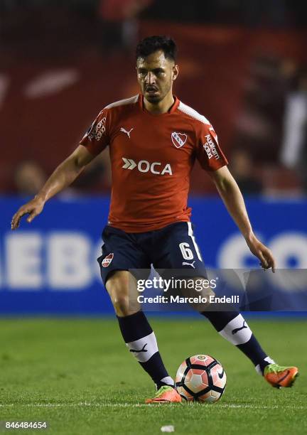 Juan Sanchez Miño of Independiente kicks the ball during a second leg match between Independiente and Atletico Tucuman as part of round of 16 of Copa...