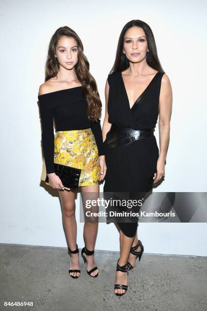 Carys Zeta Douglas and Catherine Zeta-Jones attend the Michael Kors Collection Spring 2018 Runway Show at Spring Studios on September 13, 2017 in New...