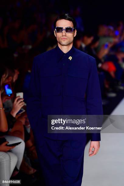 Model walks the runway at the Emre Erdemoglu show during Mercedes-Benz Istanbul Fashion Week September 2017 at Zorlu Center on September 13, 2017 in...