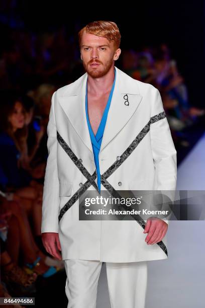 Model walks the runway at the Emre Erdemoglu show during Mercedes-Benz Istanbul Fashion Week September 2017 at Zorlu Center on September 13, 2017 in...