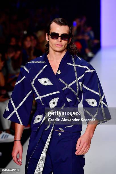 Model walks the runway at the Emre Erdemoglu show during Mercedes-Benz Istanbul Fashion Week September 2017 at Zorlu Center on September 13, 2017 in...