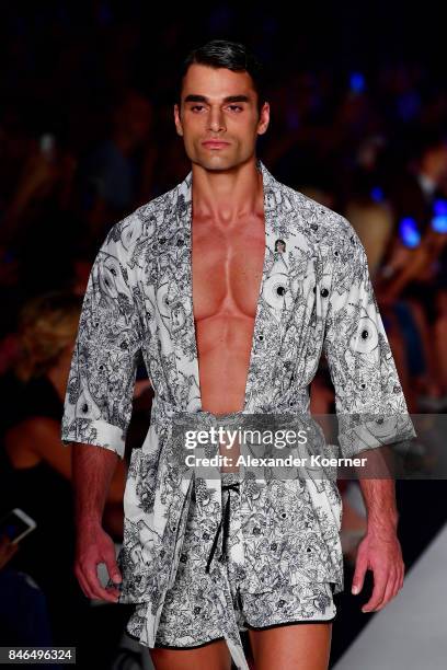 Model walks the runway at the Emre Erdemoglu show during Mercedes-Benz Istanbul Fashion Week September 2017 at Zorlu Center on September 13, 2017 in...