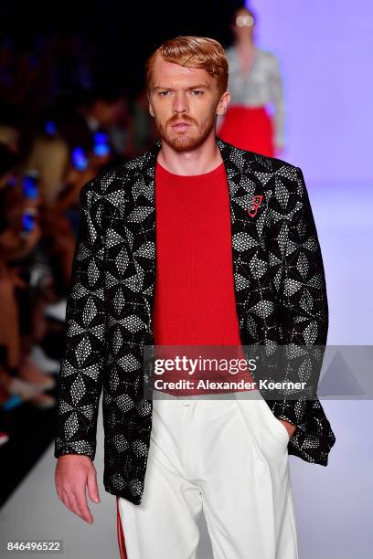 Model walks the runway at the Emre Erdemoglu show during Mercedes-Benz Istanbul Fashion Week September 2017 at Zorlu Center on September 13, 2017 in...