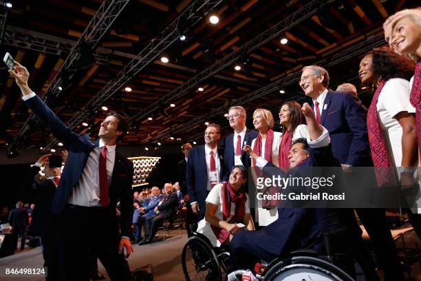 Paris 2024 Bid Co-Chair and 3-time Olympic Champion Tony Estanguet takes a selfie with other Paris 2024 Bidding Committee members during the 131th...