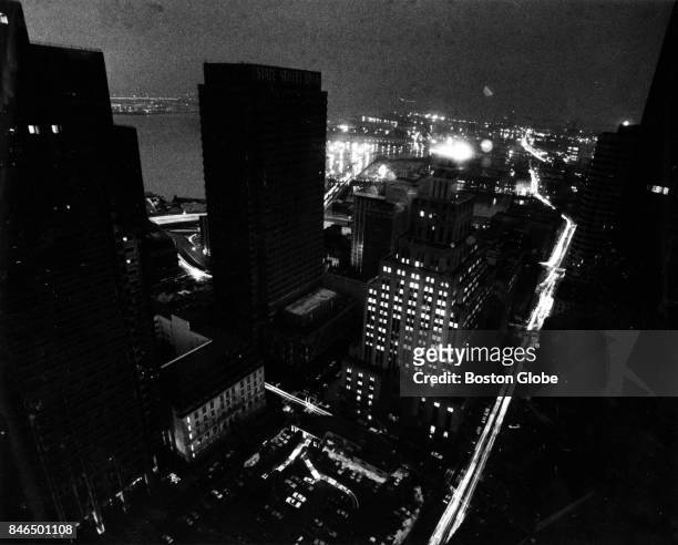 View from the 35th floor of One Federal Street in Boston shows traffic snarled on Congress Street amid blacked out buildings on Mar. 2, 1983. An...