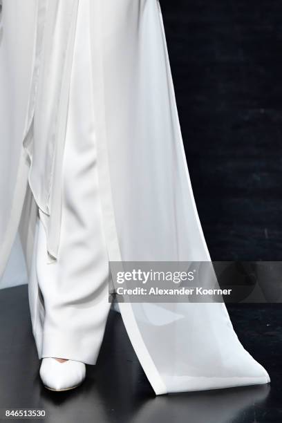 Model, dress detail, walks the runway at the Umit Kutluk show during Mercedes-Benz Istanbul Fashion Week September 2017 at Zorlu Center on September...