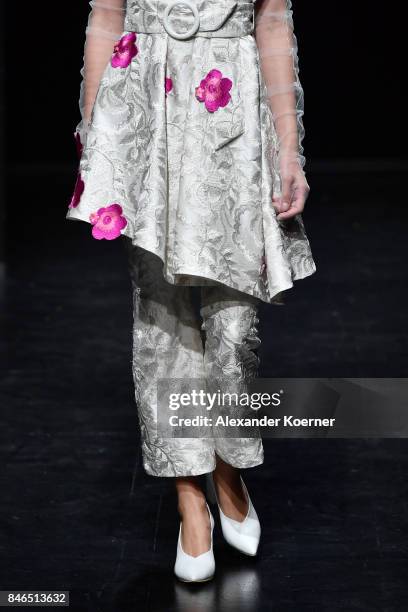 Model, dress detail, walks the runway at the Umit Kutluk show during Mercedes-Benz Istanbul Fashion Week September 2017 at Zorlu Center on September...