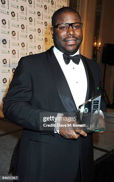 Steve McQueen poses in the winners room with the award for Breakthrough British Film-Maker during the London Critics' Circle Film Awards 2009, at the...