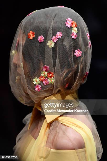 Model, headpiece details, walks the runway at the Umit Kutluk show during Mercedes-Benz Istanbul Fashion Week September 2017 at Zorlu Center on...