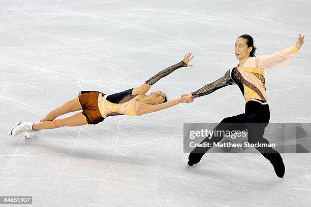 Qing Pang and Jian Tong of China skate in the Pairs Short Program during the ISU Four Continents Figure Skating Championships at Pacific Coliseum...