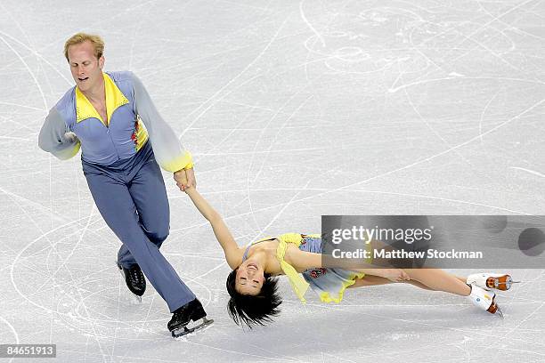 Rena Inoue and John Baldwin of the United States skate in the Pairs Short Program during the ISU Four Continents Figure Skating Championships at...