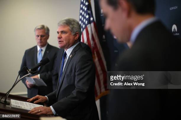 Rep. Michael McCaul speaks as House Majority Leader Rep. Kevin McCarthy listens during a news briefing September 13, 2017 at the Capitol in...